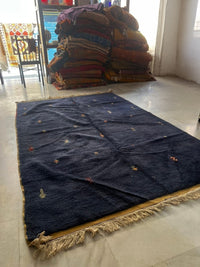 Handknotted Wool Rug — Midnight Navy Field with Scattered Polychrome Motifs