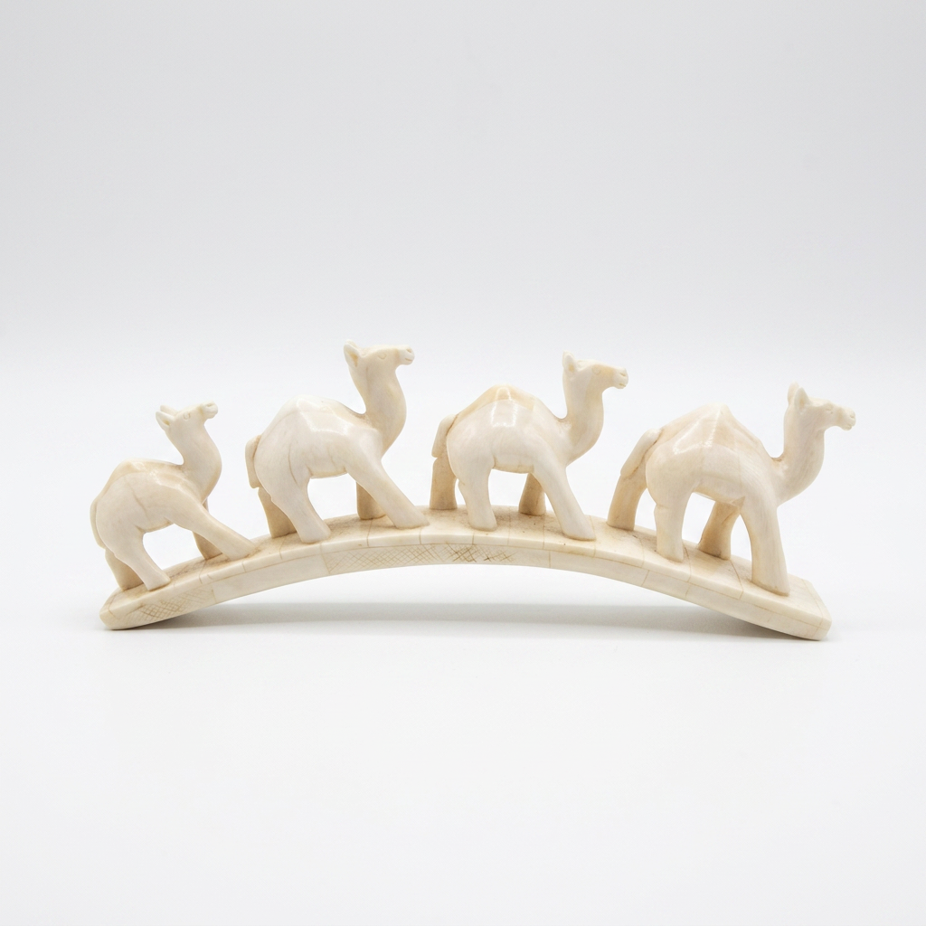 Camel Bone Caravan Sculpture — Four Camels in Procession on Arched Base