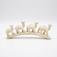 Camel Bone Caravan Sculpture — Four Camels in Procession on Arched Base