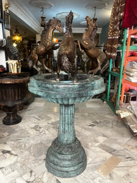 Bronze Horse Fountain — Three Rearing Stallions on Verdigris Column Pedestal