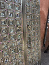 Embossed Metal & Wood Double Door — Pyramid Boss Grid with Cloisonné Enamel Rosettes
