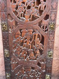 Hand-Carved African Wood Wall Panel — Three Village Life Medallions with Brass Mounts