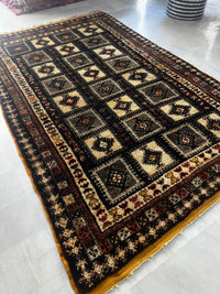 Handknotted Wool Tribal Rug — Ebony Field with Grid of Diamond Medallions